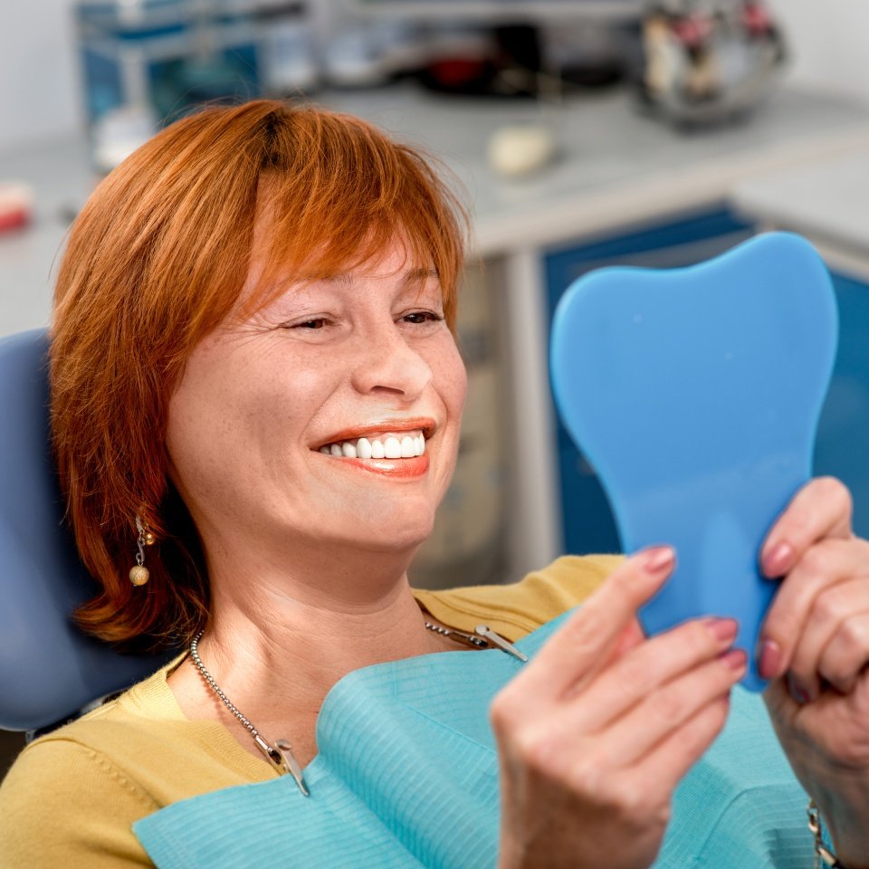 bigstock Senior woman in the dental off 77401721 medium
