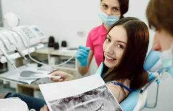 Patient consulting with a dentist about gum disease and deep root scaling procedure